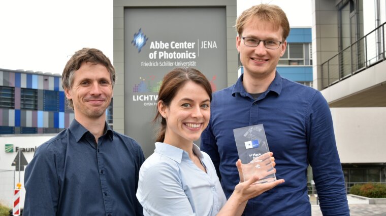 Dr. F.Eilenberger, K.Lammers and Dr. T.Vogl are happy with the DLRG Award